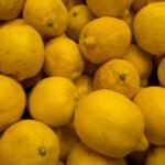 a pile of lemons sitting next to each other